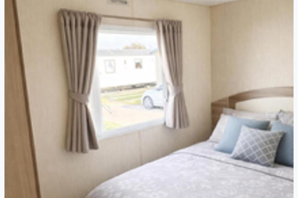 Declan 3 Bedroom Caravan Sleeps 6 -Balcony & Patio House in Rhyl
