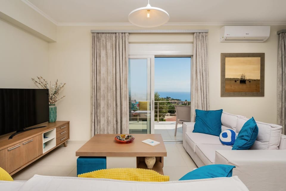 TV and multimedia, Living room, Photo of the whole room, Seating area, Sea view, air conditioner