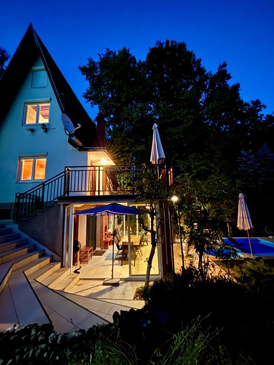 Property building, Patio, Night, Garden, Garden view, Pool view, Swimming pool