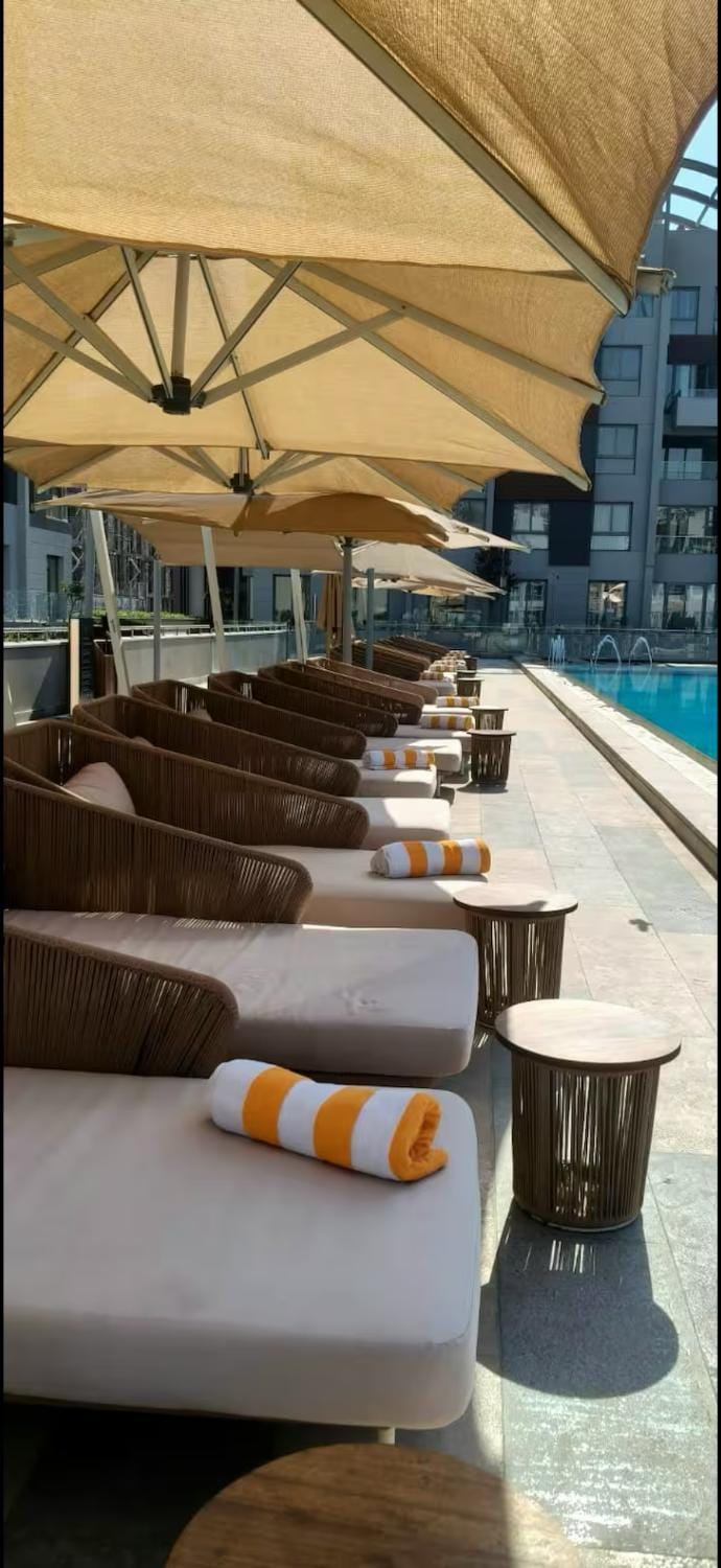 Swimming pool, sunbed