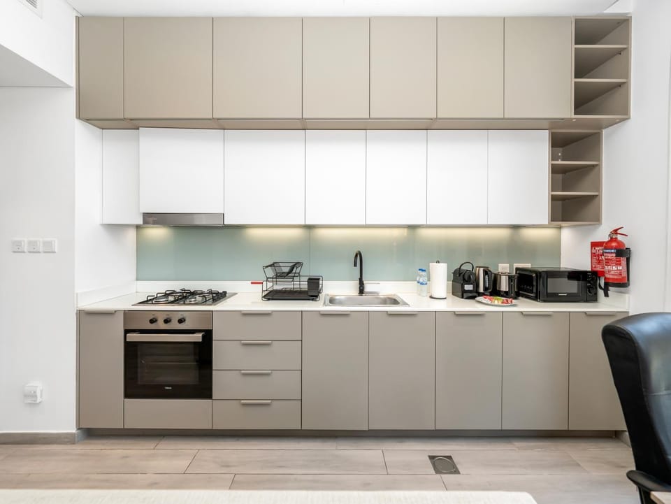 Kitchen or kitchenette, stove, toaster