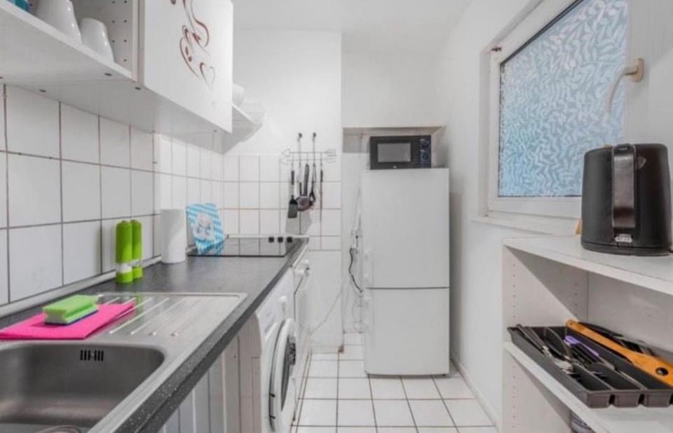 Kitchen or kitchenette, oven, stove, toaster