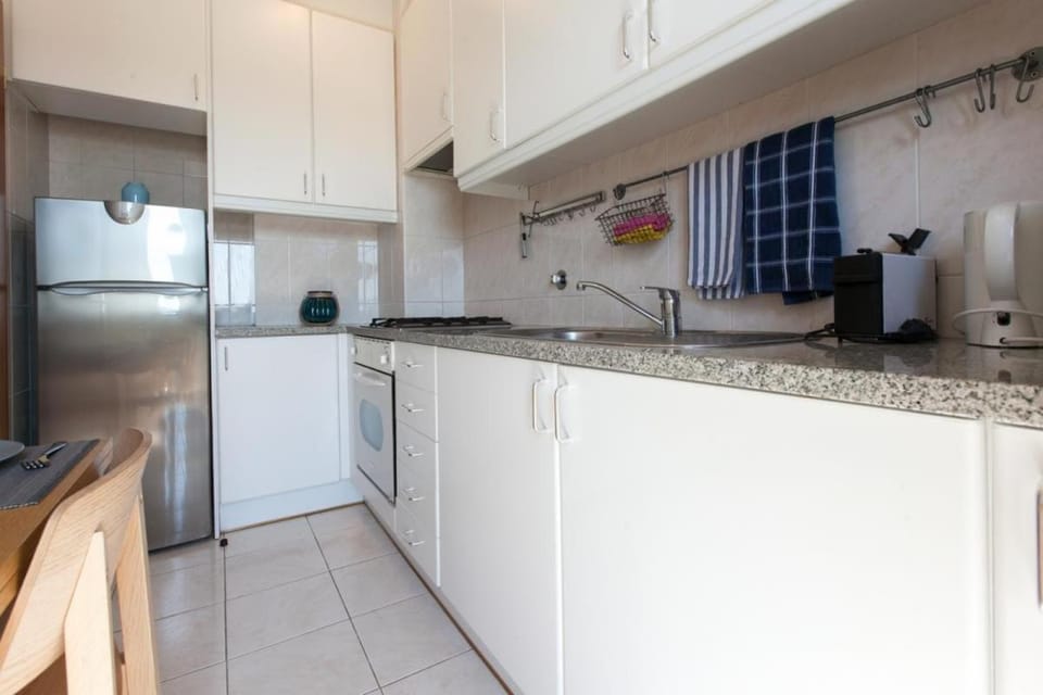 Kitchen or kitchenette, oven, stove