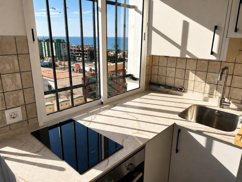 Kitchen or kitchenette, stove, kitchen