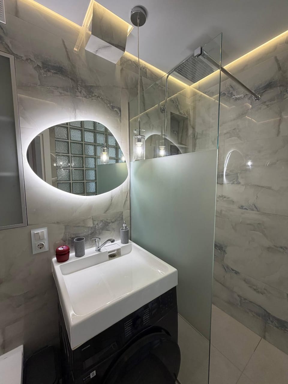 Shower, towels, washing machine, washing machine, dryer