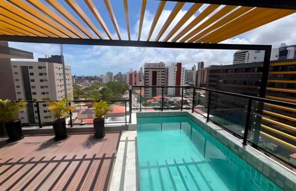 Property building, Patio, Day, View (from property/room), Balcony/Terrace, City view, Pool view, Swimming pool, Swimming pool, sunbed