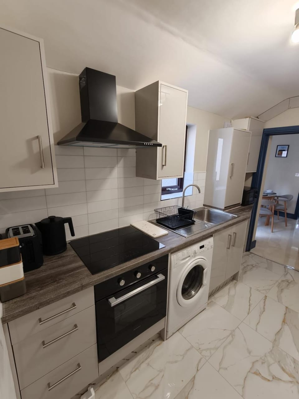 Kitchen or kitchenette, oven, toaster