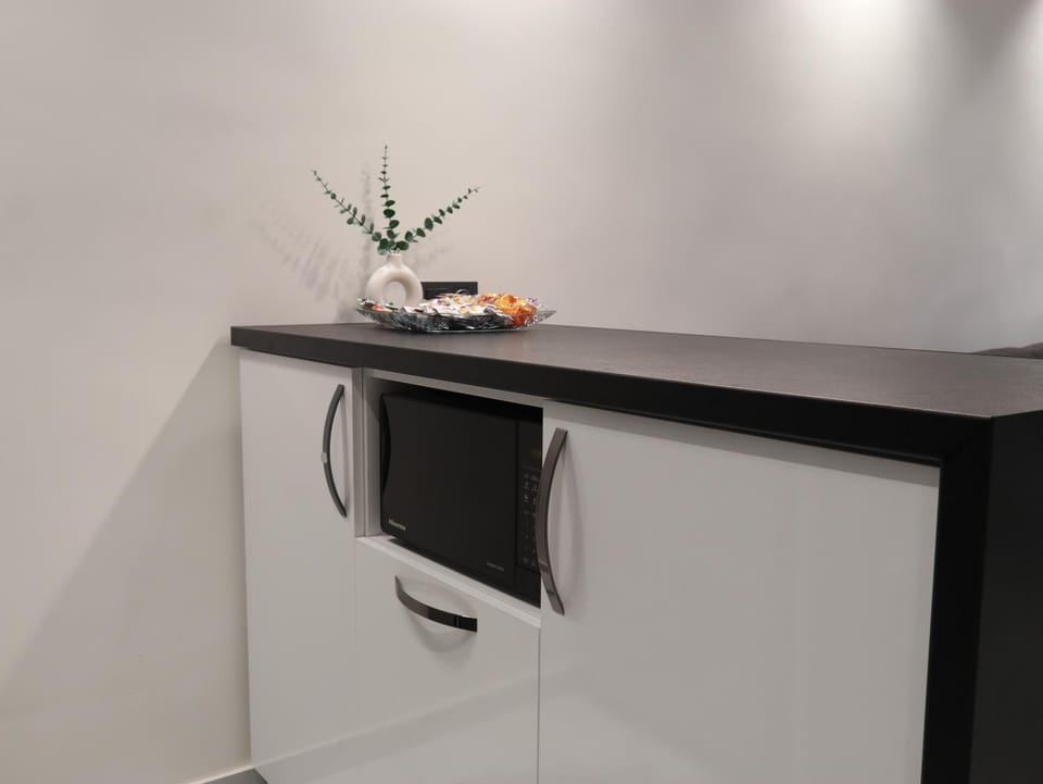 Kitchen or kitchenette, stove