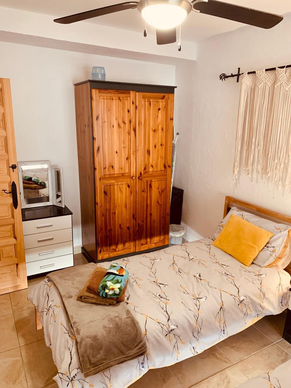 Photo of the whole room, fireplace, towels, wardrobe