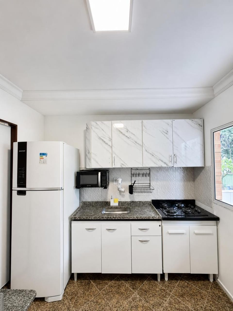 Kitchen or kitchenette, stove