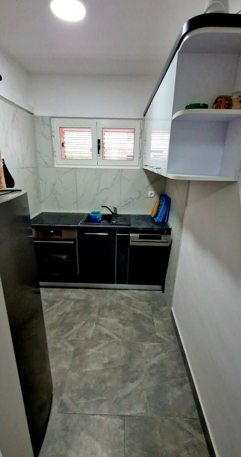 Kitchen or kitchenette, oven, stove
