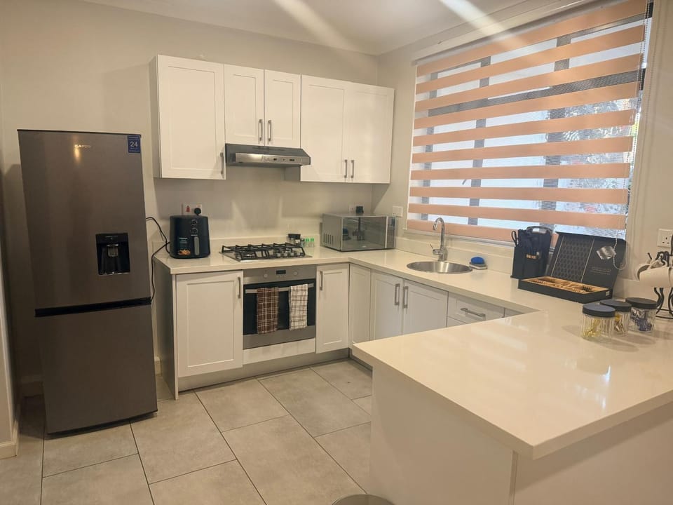 Kitchen or kitchenette, oven, stove
