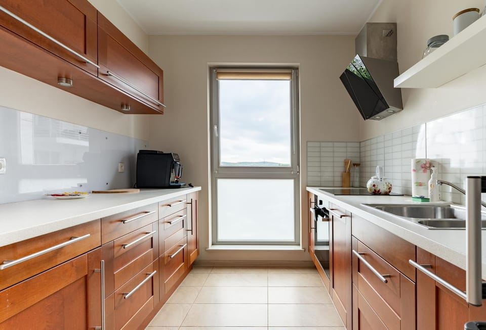 Kitchen or kitchenette, dishwasher, oven, stove, toaster