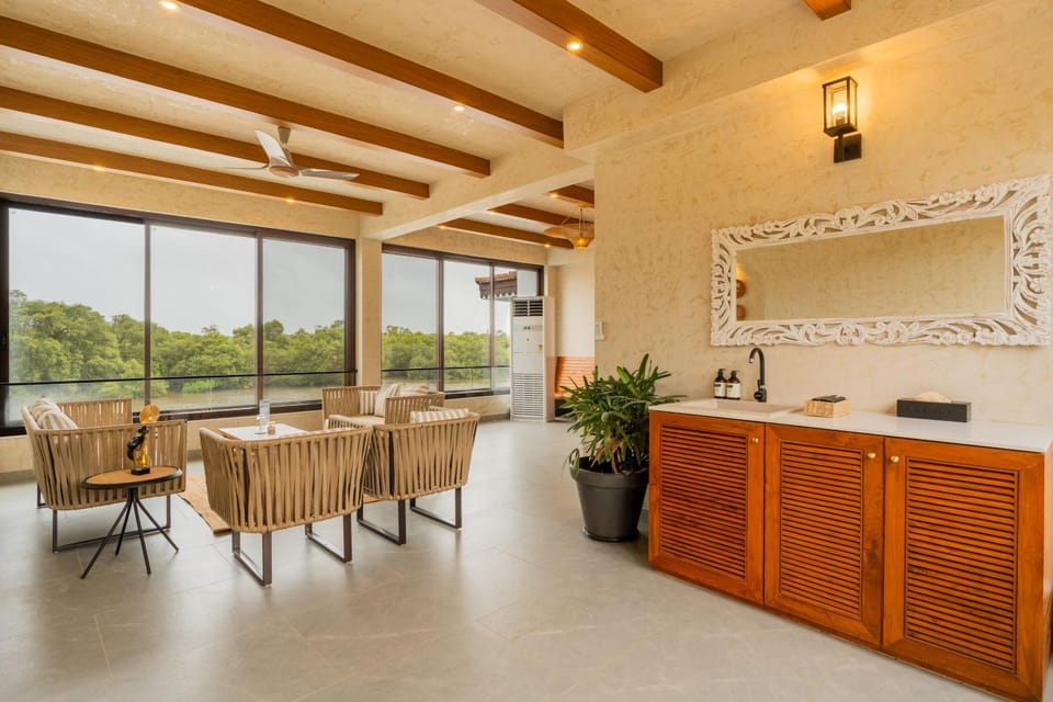 Villa Riviere 9-BHK Private Riverfront Estate with 2 Infinity Pools, Lift, Lounge Area & Kids' Room Villa in Candolim