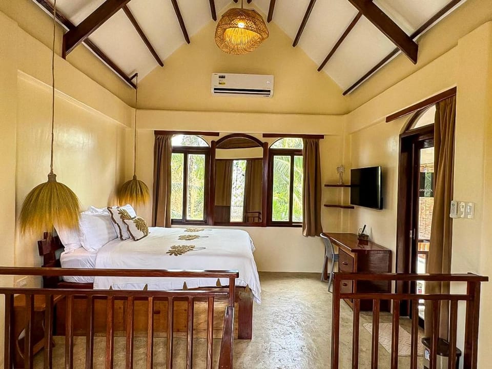 Communal lounge/ TV room, Bed, TV and multimedia, Living room, Photo of the whole room, Seating area, Evening entertainment, Bedroom, air conditioner