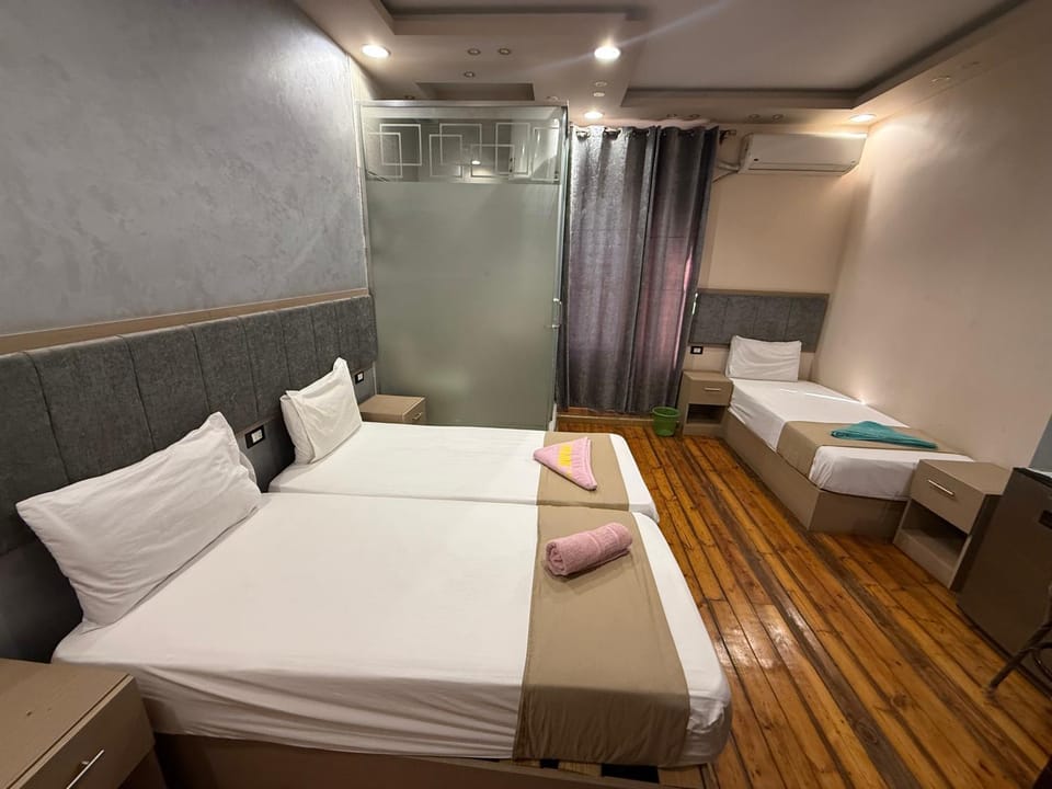 Bed, Photo of the whole room, Seating area, Bedroom, towels, wardrobe