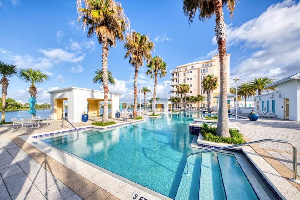 Lakefront dog-friendly condo with water views pool hot tub & beach access Apartment in Carillon Beach