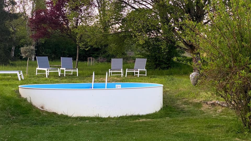 Property building, Living room, Swimming pool