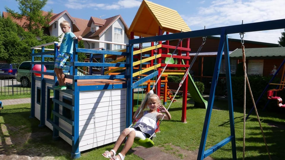 AIDA Domki Letniskowe - domki 5 min od MORZA - Plac Zabaw & ANIMACJE dla DZIECI, ROWERY gratis dla Gości Nature lodge in West Pomeranian Voivodeship, Poland