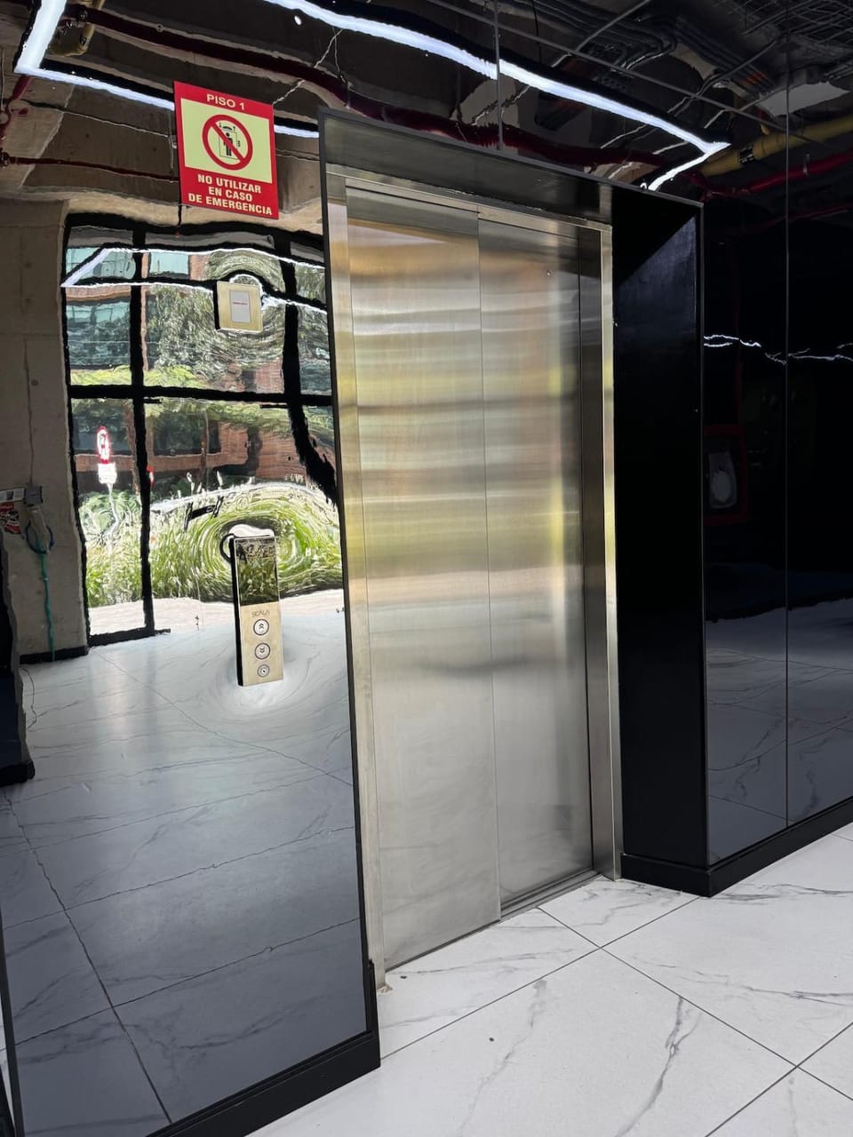 Property building, elevator