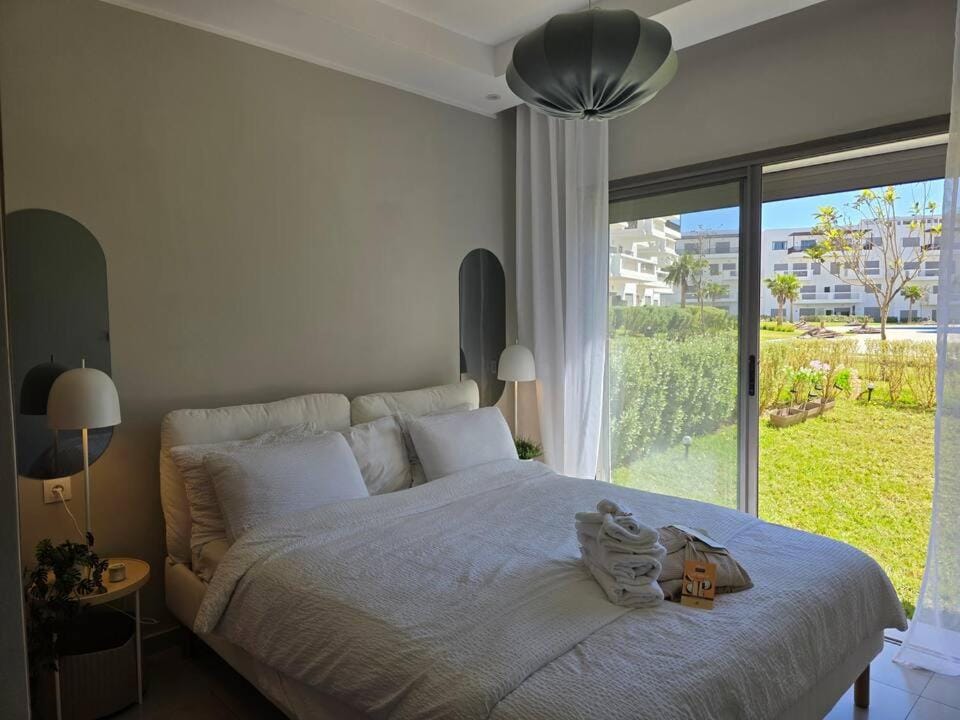 Appartement élégant avec jardin et accès direct à la piscine Cabo Huerto del Rio Apartment in Tangier-Tétouan-Al Hoceima