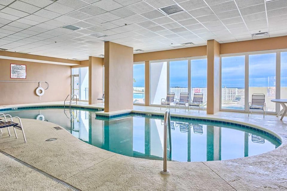 Gulf-Front Condo w Shaded Balcony WiFi AC & Shared Pools Hot Tubs & Sauna House in Gulf Shores