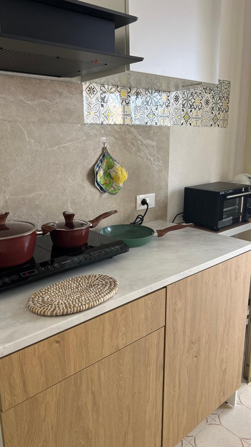 Kitchen or kitchenette, stove