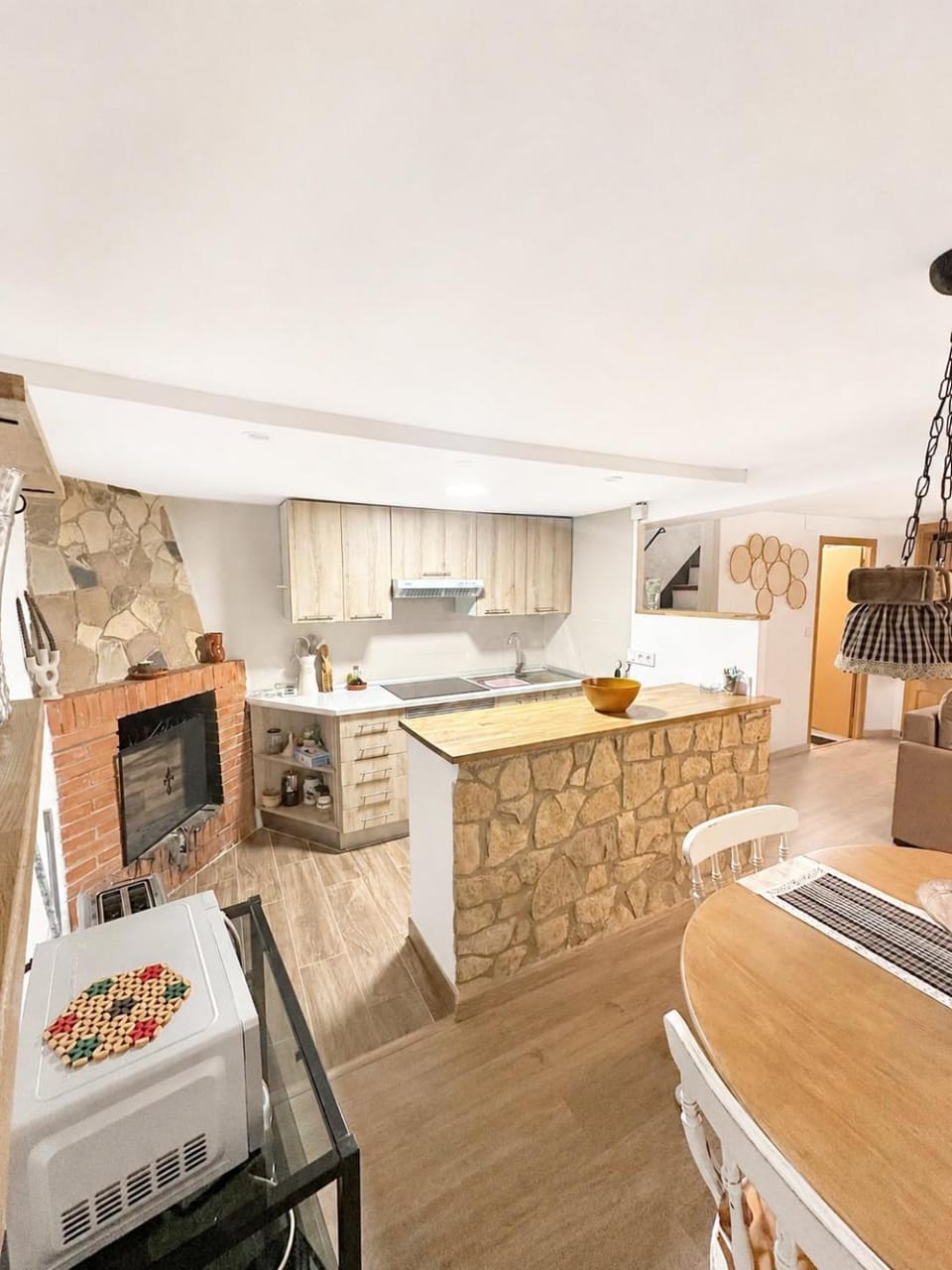 fireplace, microwave, stove, kitchen