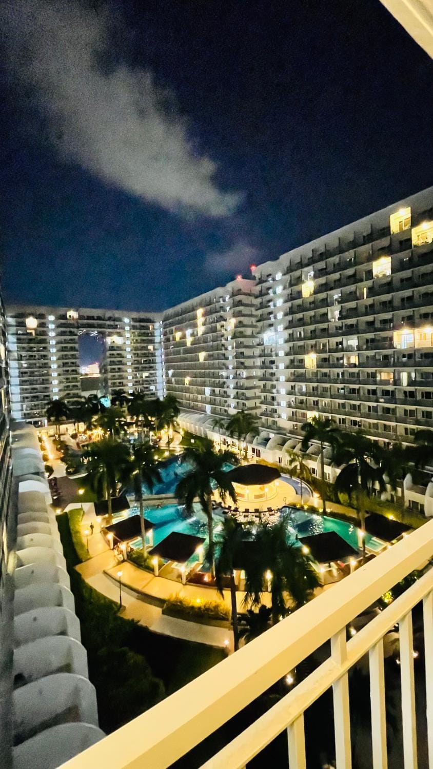 Property building, Patio, Night, View (from property/room), Balcony/Terrace, City view, Pool view, Swimming pool