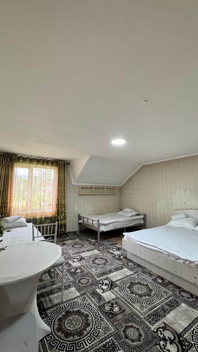 Bed, Living room, Seating area, Bedroom