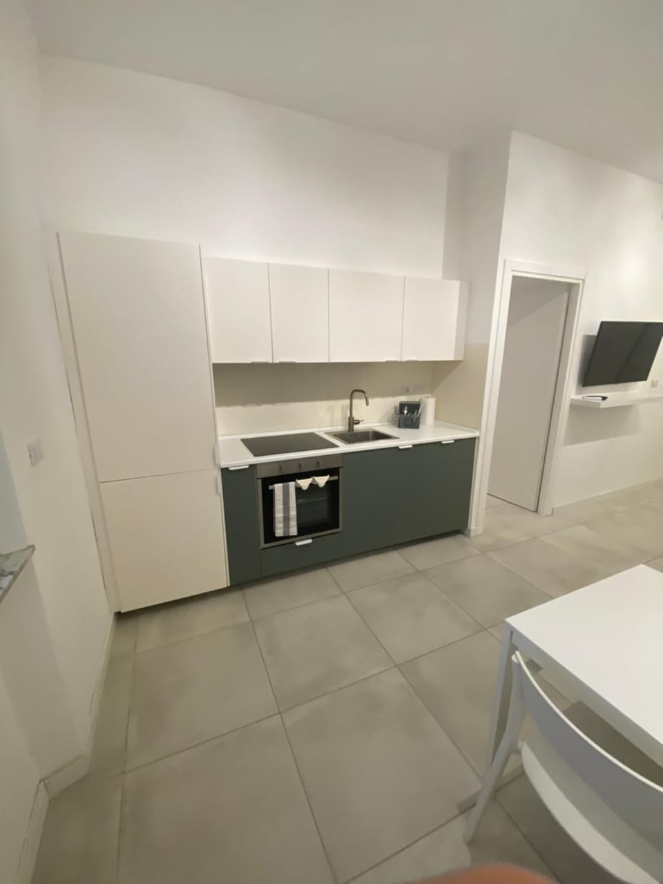 Kitchen or kitchenette, oven, stove