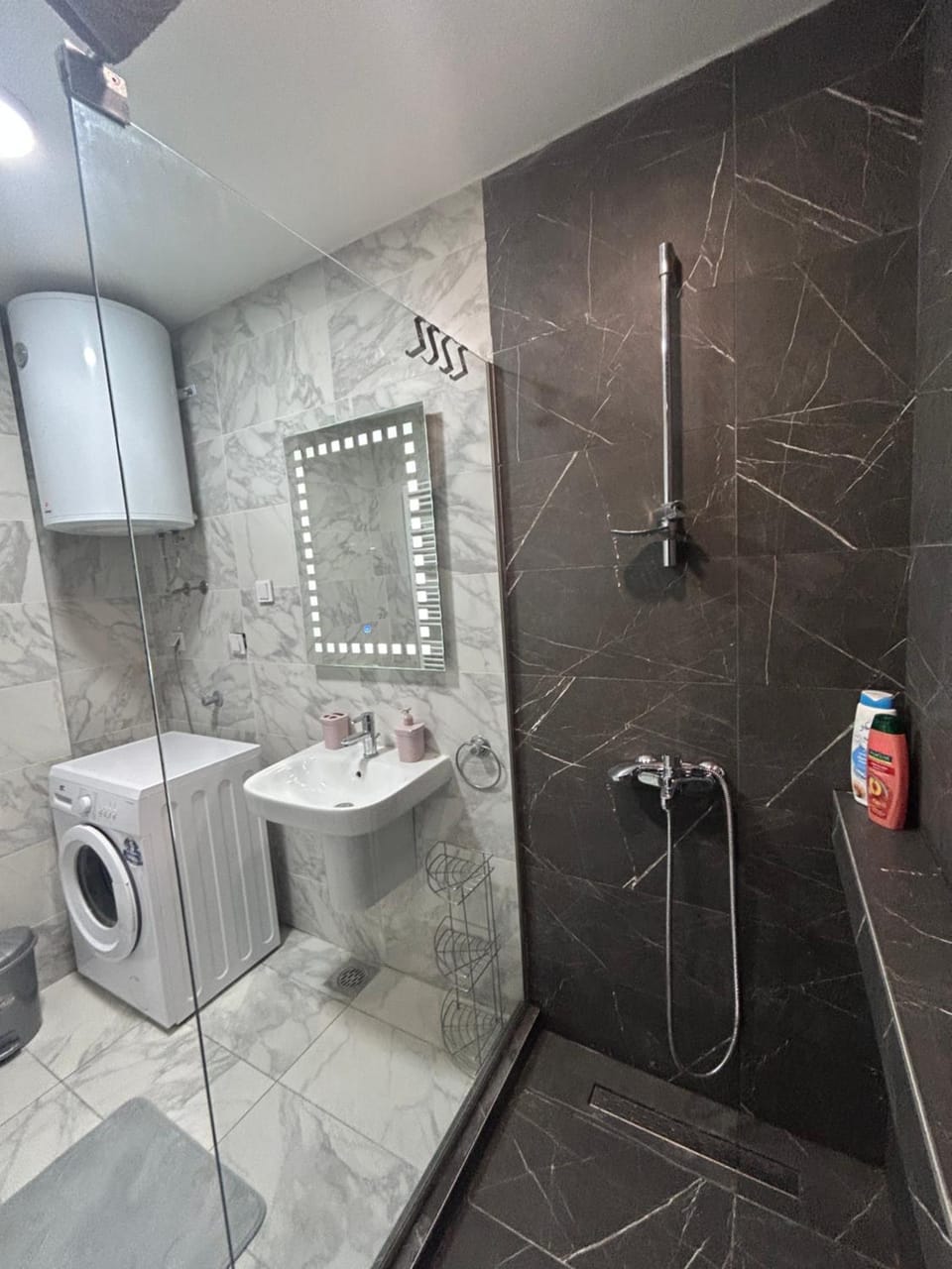Shower, Toilet, Bathroom, towels, washing machine, dryer