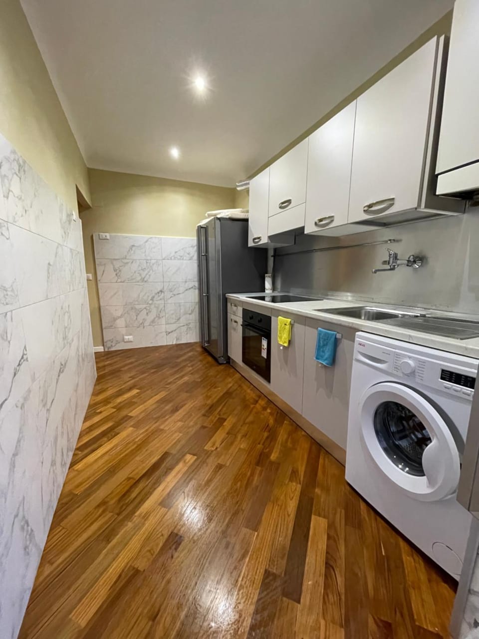 Kitchen or kitchenette, dishwasher, minibar, oven, stove, washing machine, dryer