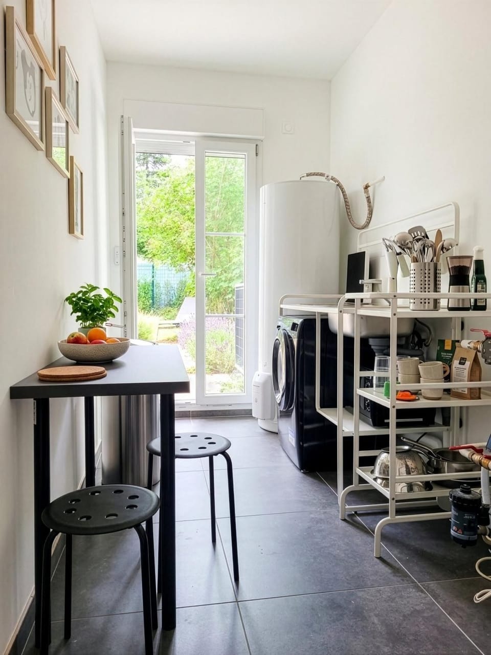 Kitchen or kitchenette, Dining area, microwave, stove, washing machine, dryer