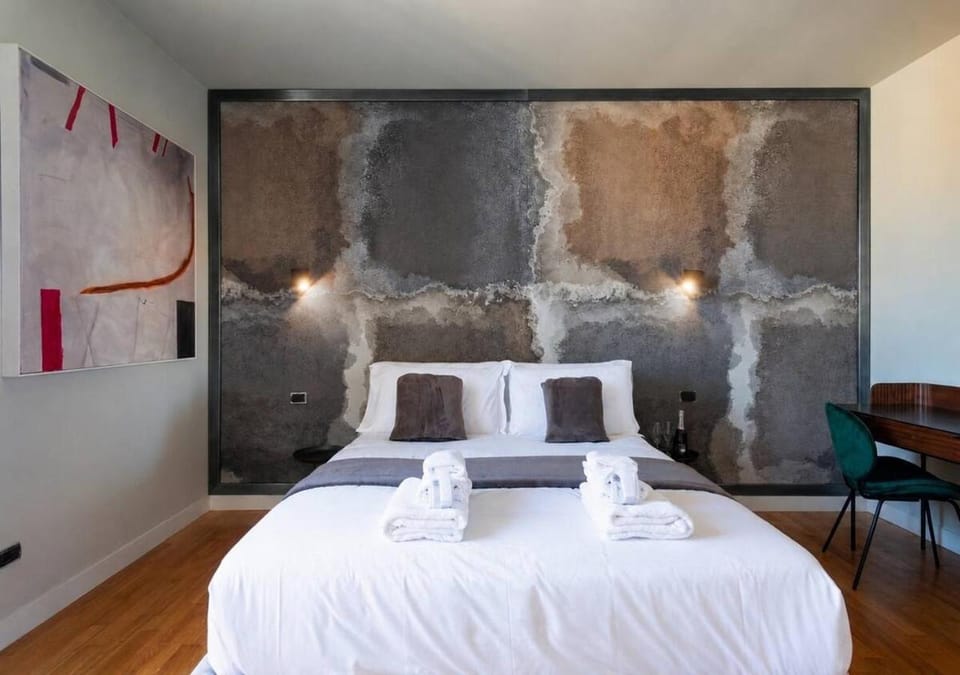 Property building, Bed, View (from property/room), Photo of the whole room, Bedroom, City view, towels, air conditioner