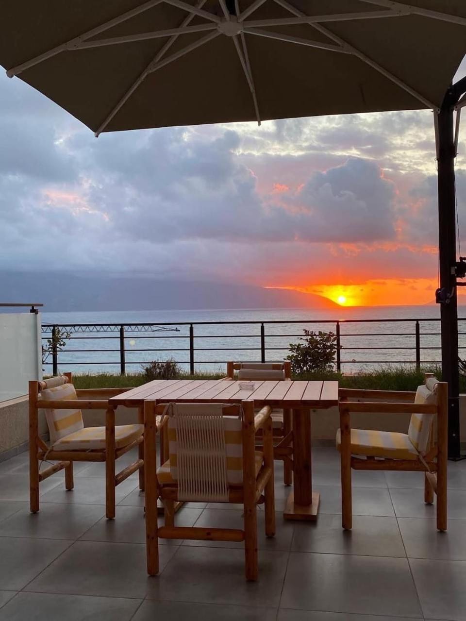 Natural landscape, View (from property/room), Seating area, Sea view, Sunset