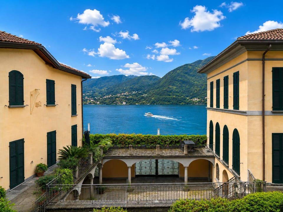 Property building, Nearby landmark, Spring, Day, Natural landscape, View (from property/room), Lake view, Mountain view