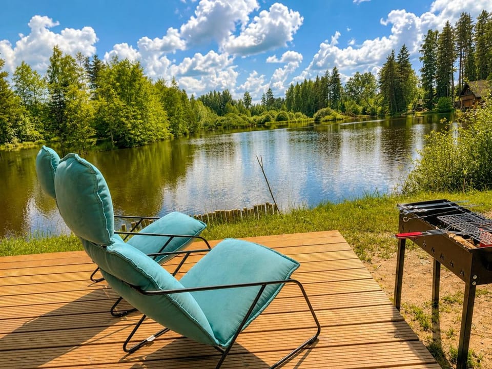 Glass Cabin by the Lake with Hot Tub near Alpaca and Deer Park Cabin in Latvia