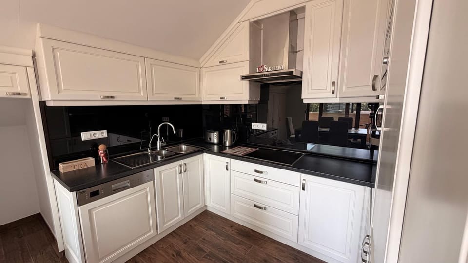 Kitchen or kitchenette, stove, toaster