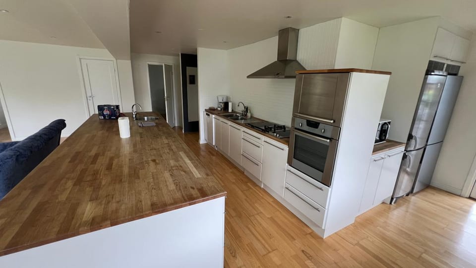 Kitchen or kitchenette, dishwasher, oven, stove