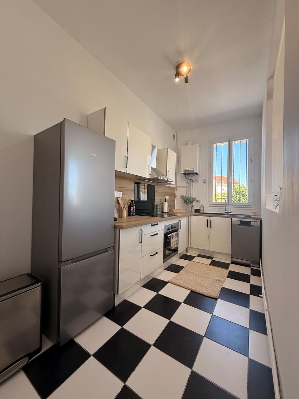 Kitchen or kitchenette, dishwasher, oven, stove