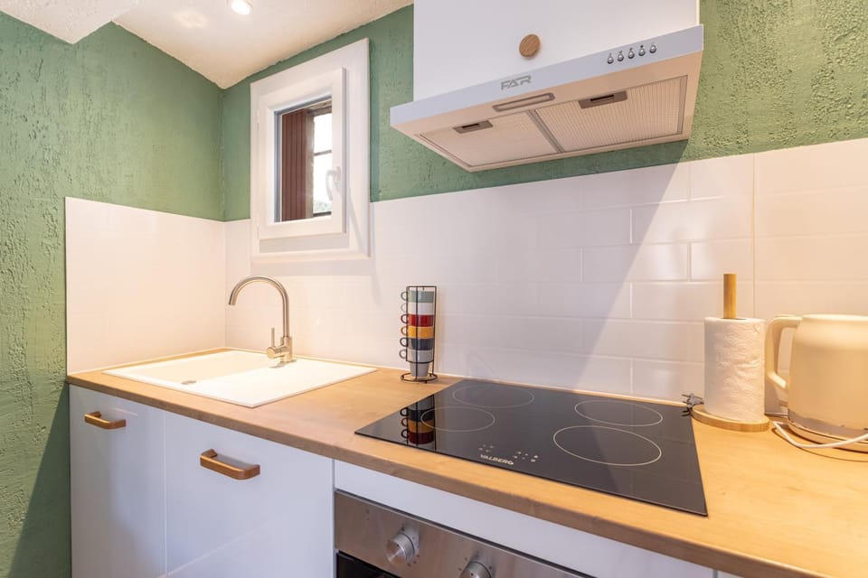 Kitchen or kitchenette, stove