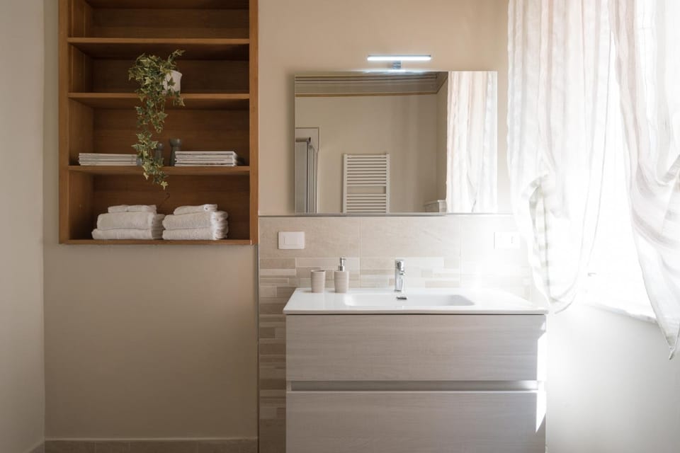 Bathroom, hair dryier, towels