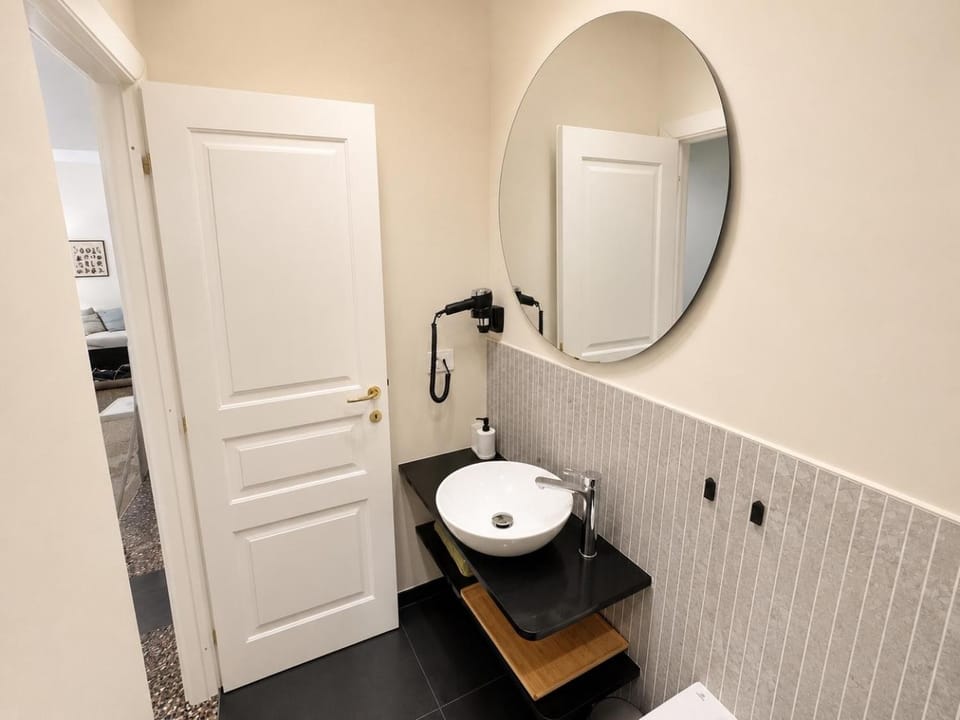 Bathroom, hair dryier, washing machine, dryer