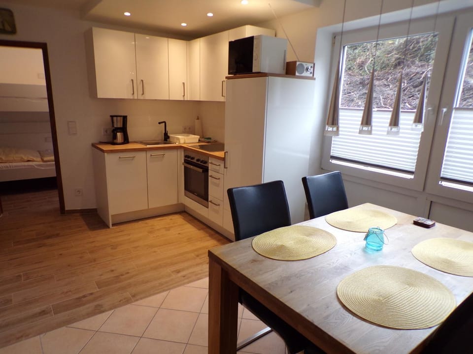Kitchen or kitchenette, stove, toaster