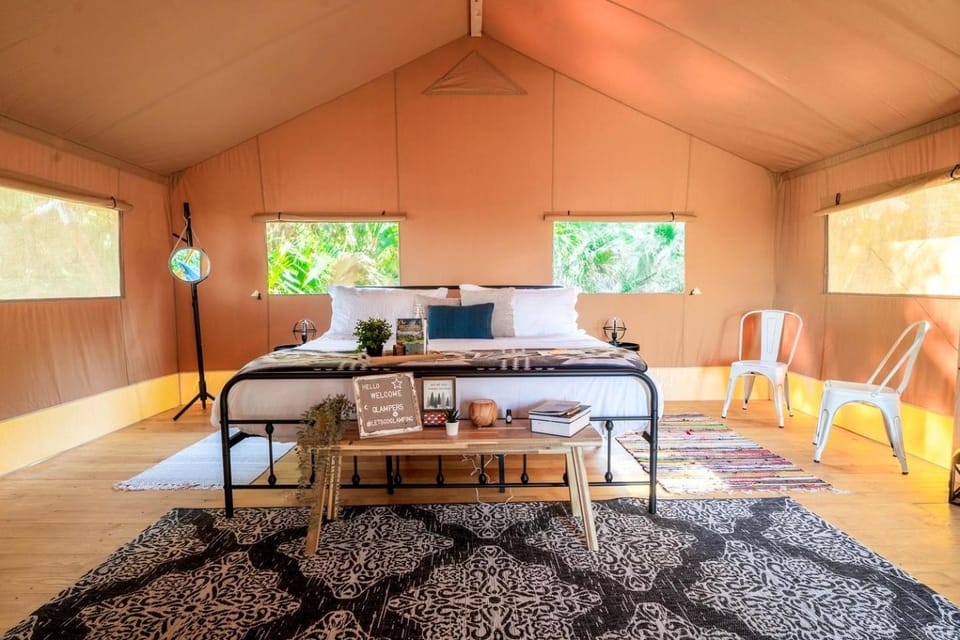 Spacious Deluxe Safari Tent with Fire Pit & BBQ Grill in Basinger, Florida Luxury tent in Lake Okeechobee