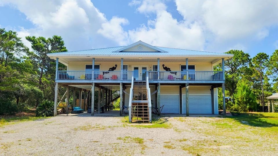 Charming Beachside Home with Private Patio & Dog-Friendly Policy near Surfside Shores, Gulf Shores, AL House in Alabama