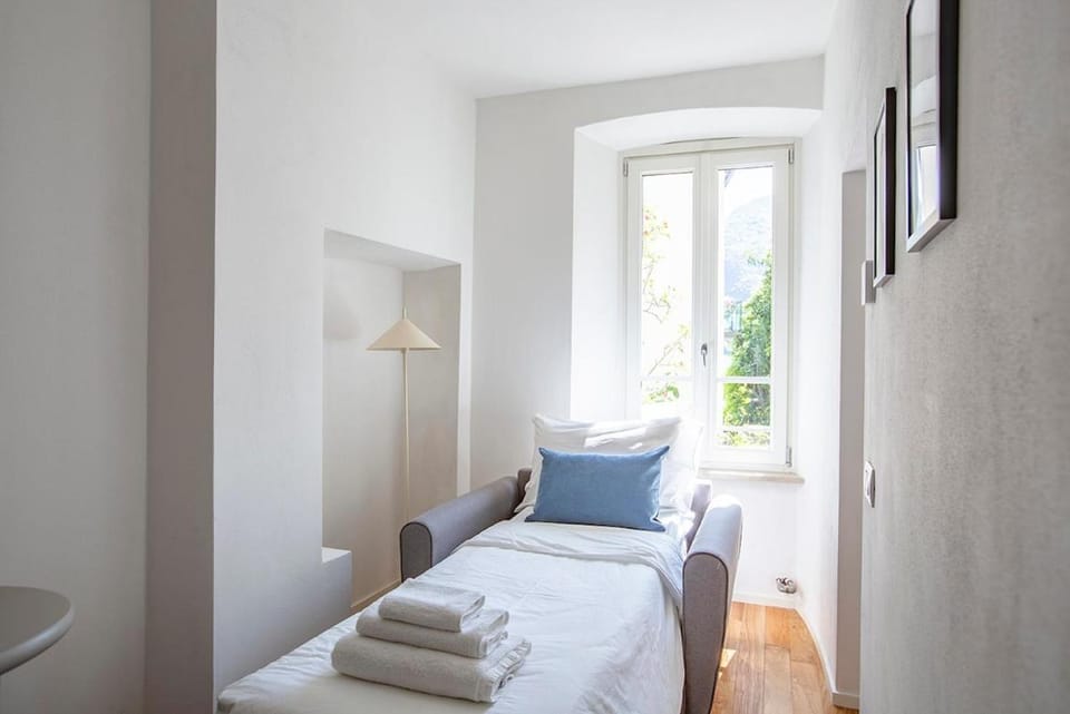 Lake Como with view, sauna and air conditioning Apartment in Mandello del Lario