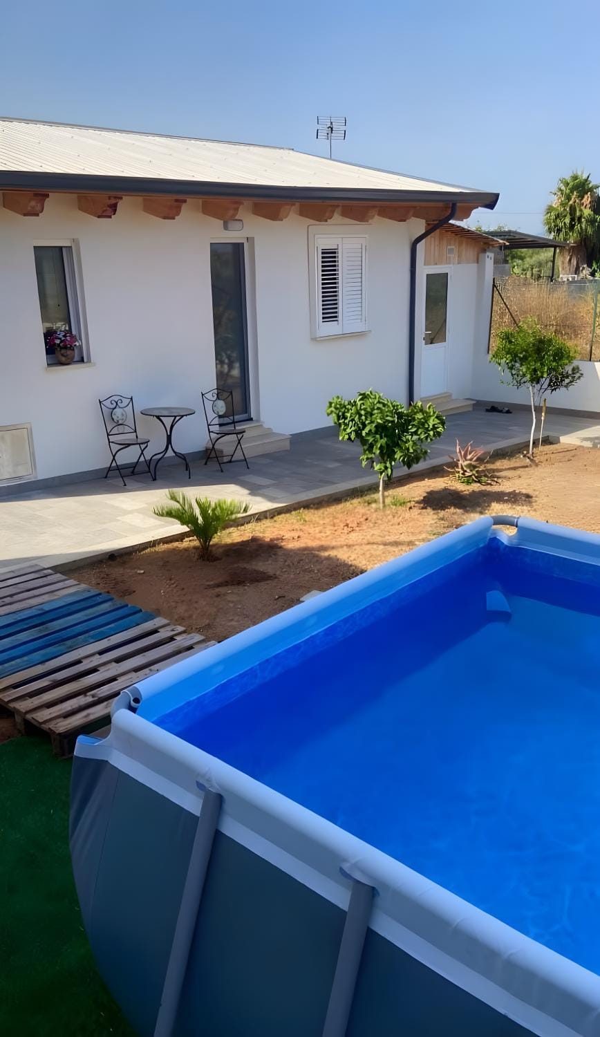 Property building, Living room, Swimming pool