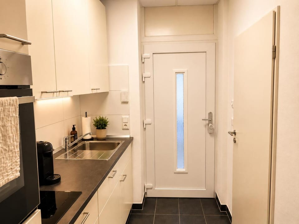 Kitchen or kitchenette, oven, stove